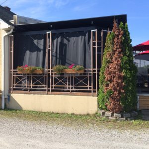 Rideau abri-soleil pour terrasse