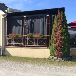 Rideau abri-soleil pour terrasse