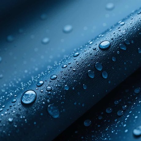 close up macro shot of waterproof fabric with water drops